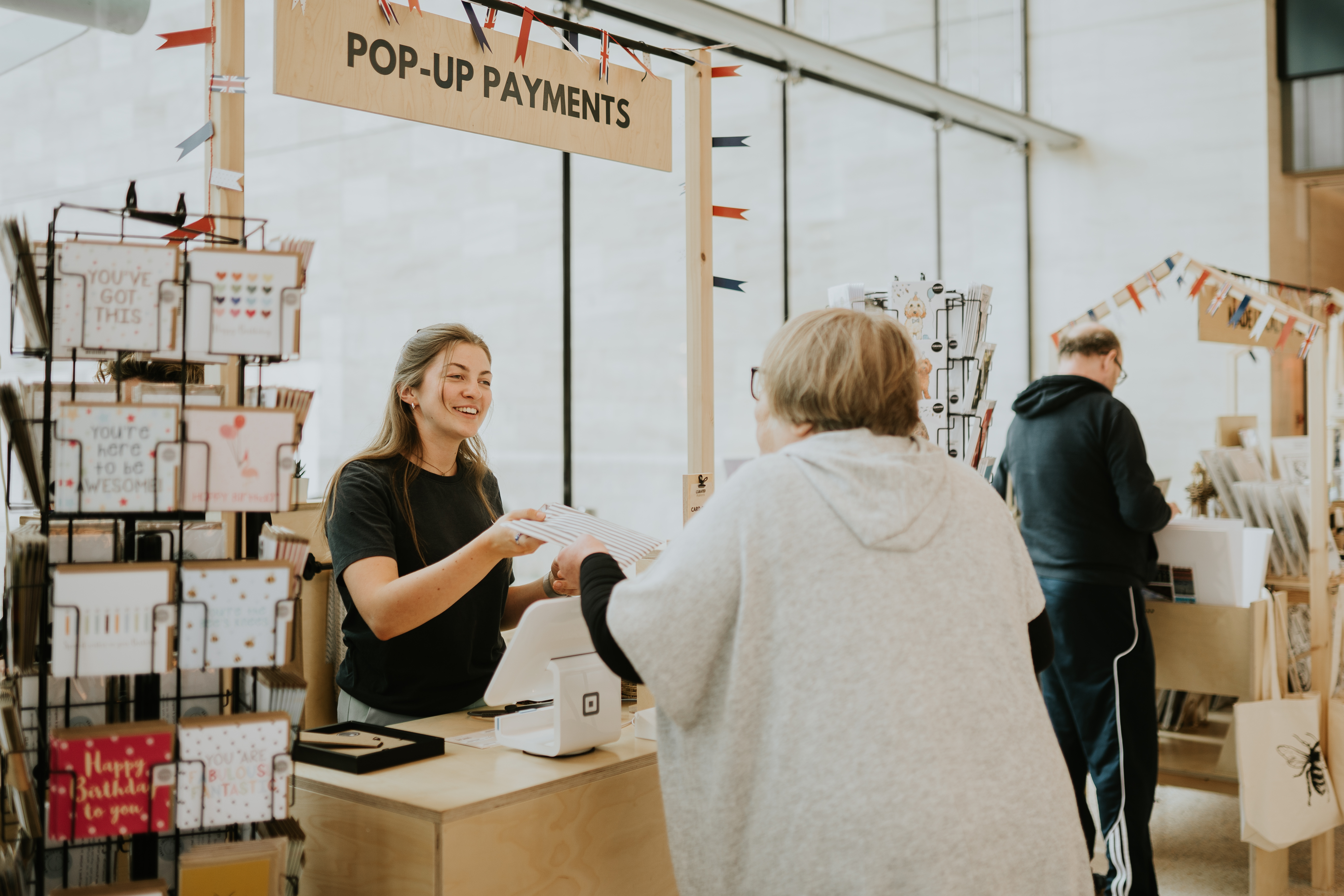 Curated Makers Team Member at the till 