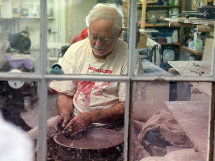 Ned Haywood working at his studio