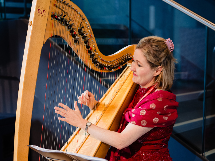 Bethan Nia playing the harp