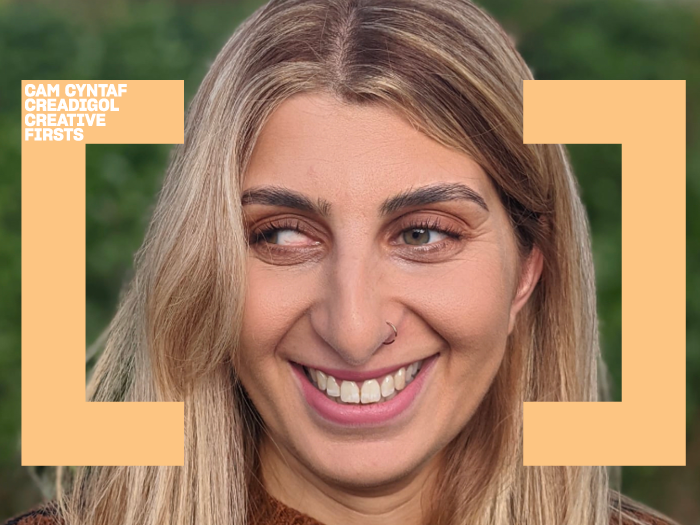 A headshot of Tafsila smiling, with the Creative Cardiff logo in orange framing her face