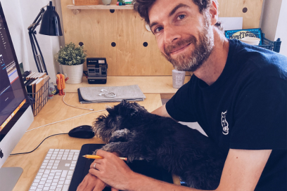 A headshot of Matt with a dog