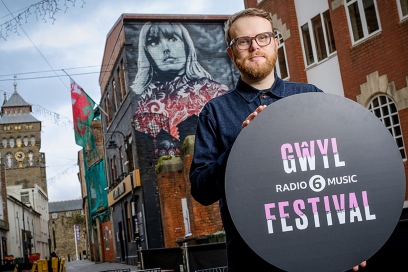 Huw Stephens holding 6Music circle